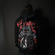 Anime-inspired apparel featuring bold back artwork, worn by a model in a dark studio setting – from a South African anime clothing brand.