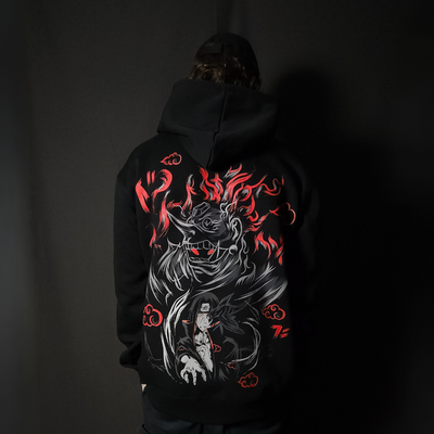 Anime-inspired apparel featuring bold back artwork, worn by a model in a dark studio setting – from a South African anime clothing brand.