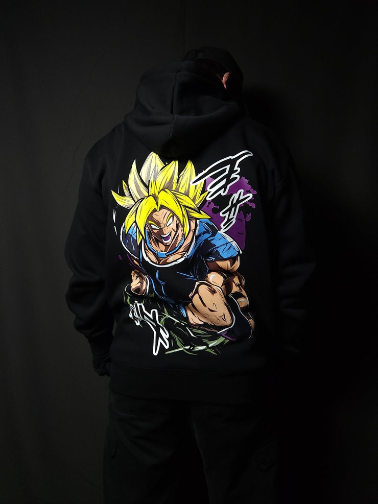 Anime-inspired apparel featuring bold back artwork, worn by a model in a dark studio setting – from a South African anime clothing brand.