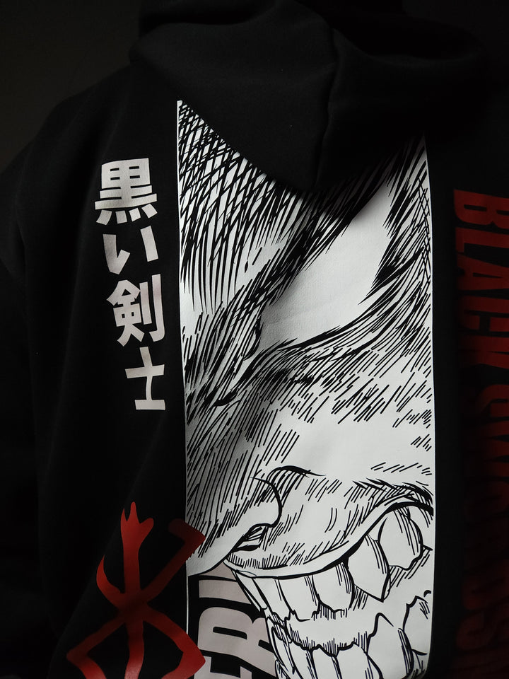 Anime-inspired apparel featuring bold back artwork, worn by a model in a dark studio setting – from a South African anime clothing brand.