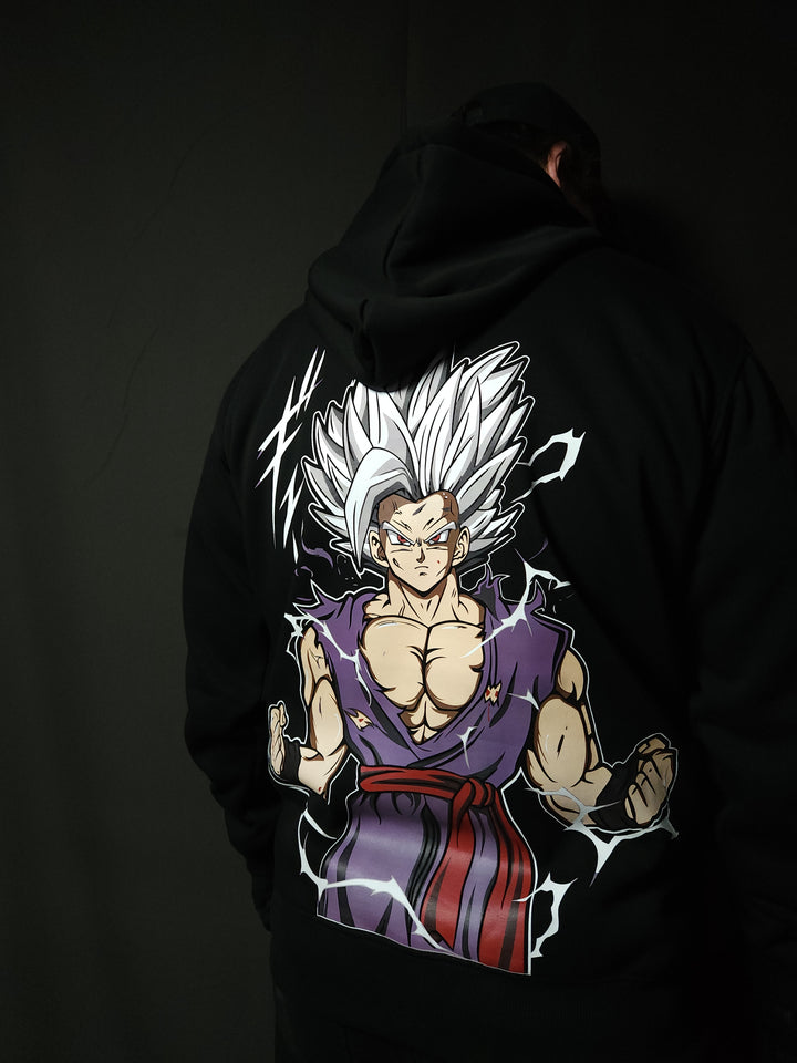Anime-inspired apparel featuring bold back artwork, worn by a model in a dark studio setting – from a South African anime clothing brand.