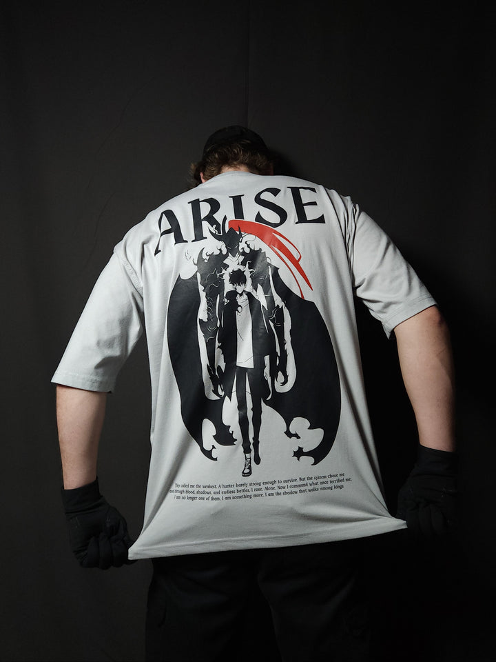 Anime-inspired apparel featuring bold back artwork, worn by a model in a dark studio setting – from a South African anime clothing brand.