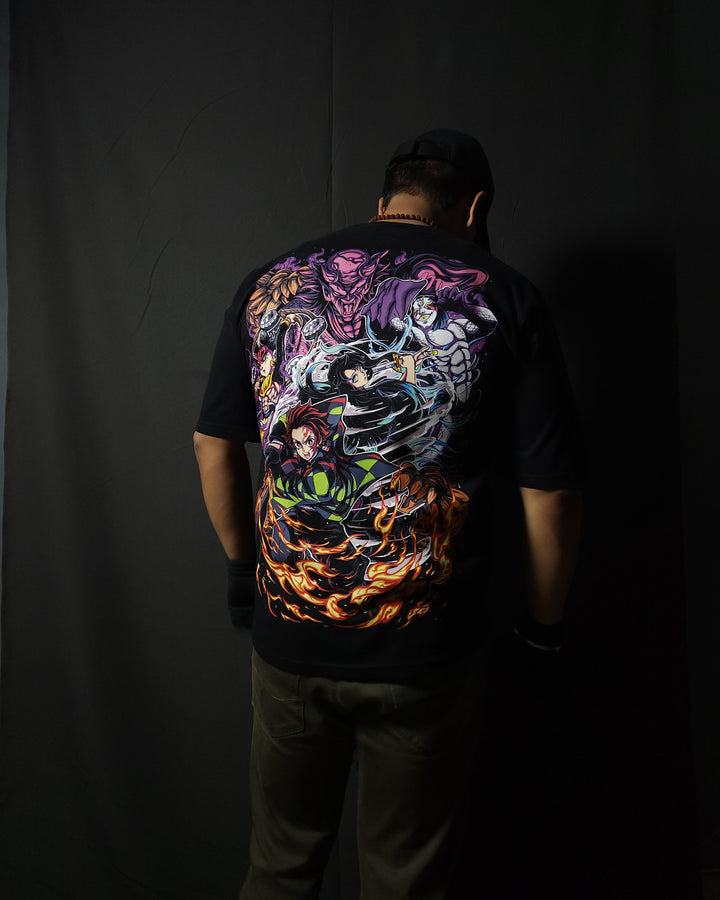 Anime-inspired apparel featuring bold back artwork, worn by a model in a dark studio setting – from a South African anime clothing brand.