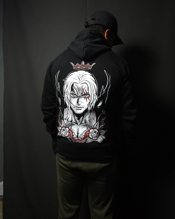 Anime-inspired apparel featuring bold back artwork, worn by a model in a dark studio setting – from a South African anime clothing brand.
