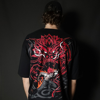 Anime-inspired apparel featuring bold back artwork, worn by a model in a dark studio setting – from a South African anime clothing brand.