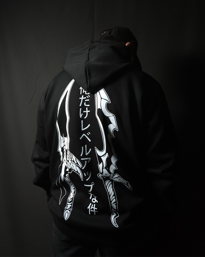 Anime-inspired apparel featuring bold back artwork, worn by a model in a dark studio setting – from a South African anime clothing brand.
