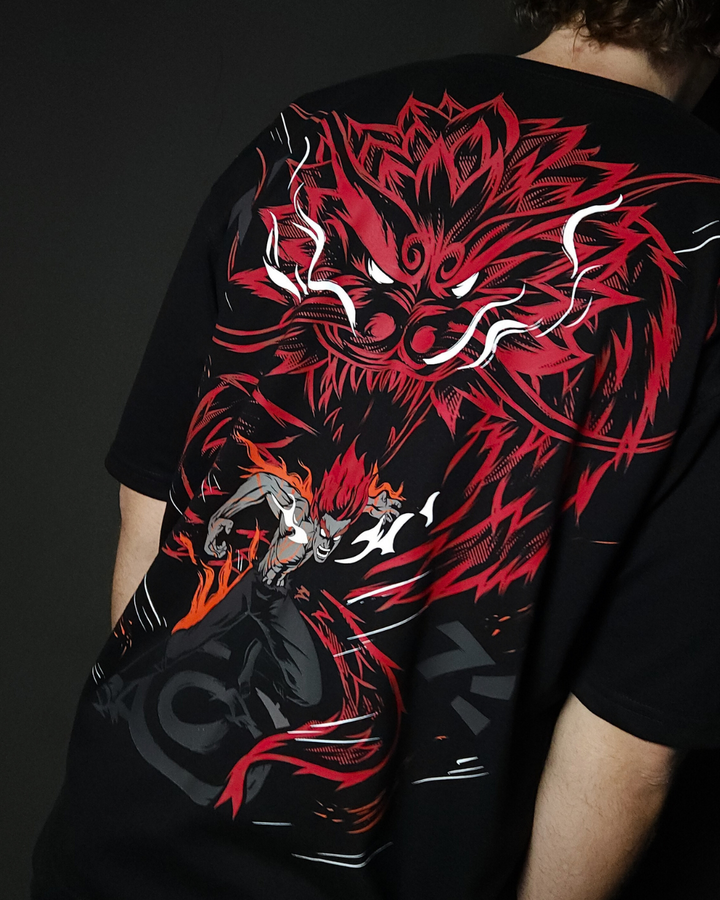 Anime-inspired apparel featuring bold Naruto back artwork, worn by a model in a dark studio setting – from a South African anime clothing brand.