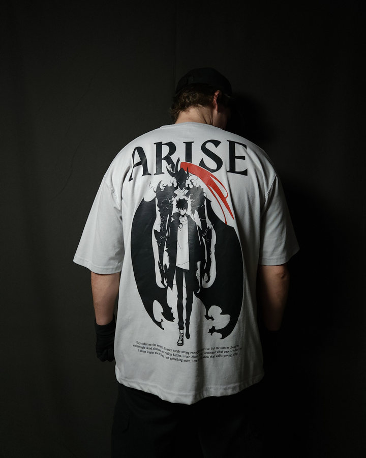 Anime-inspired apparel featuring bold back artwork, worn by a model in a dark studio setting – from a South African anime clothing brand.