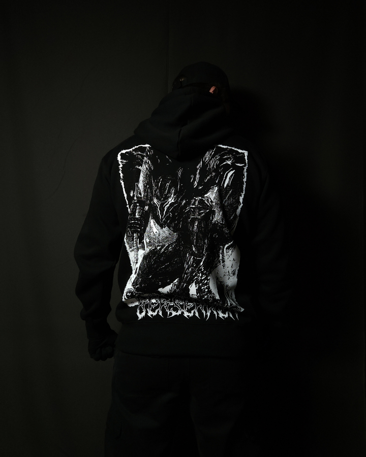 Anime-inspired apparel featuring bold back artwork, worn by a model in a dark studio setting – from a South African anime clothing brand.