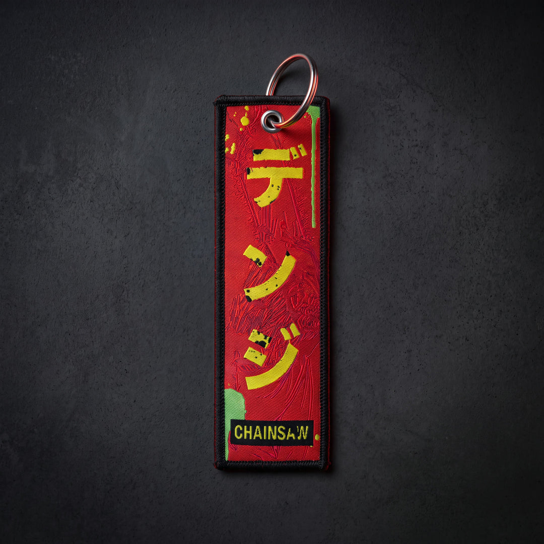 Chainsaw jet tag, front